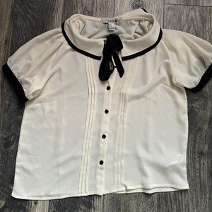 Collared white and black blouse